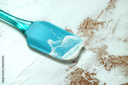 Wallpaper Mural A man applies white plaster with a spatula Torontodigital.ca