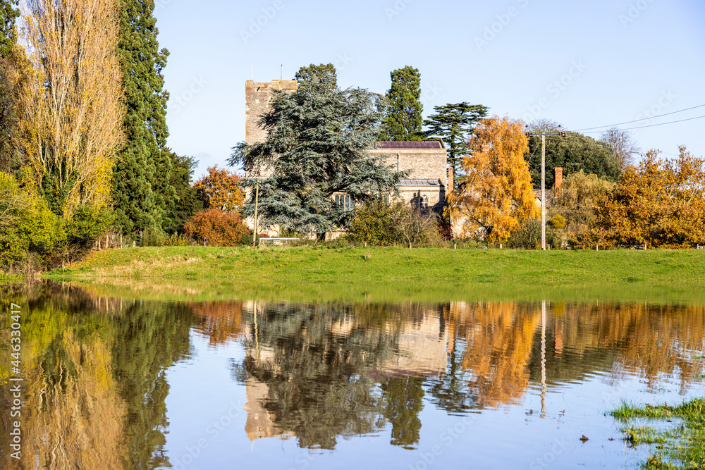 St Marys church viewed across floodwater from the River Severn filling the fields in the Severn Vale village of Deerhurst, Gloucestershire UK on 18/11/2019 St Marys church viewed across floodwater from the River Severn filling the fields in the Severn Vale village of Deerhurst, Gloucestershire UK on 18/11/2019