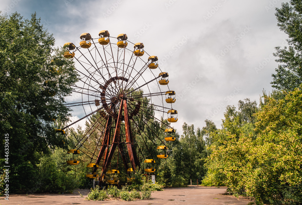 Abandoned ferris wheel in the decaying amusement park of Pripyat, Ukraine inside the Chernobyl Exclusion Zone