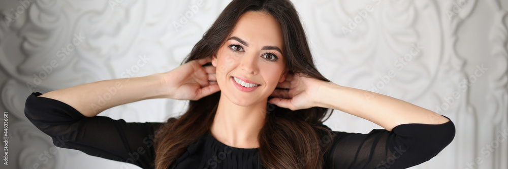 Portrait beautiful brunette woman in black dress Portrait beautiful brunette woman in black dress
