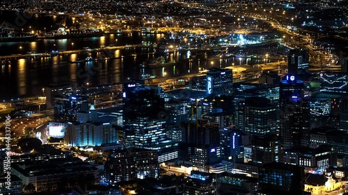 Time lapse at night of Cape Town city bowl and harbour. Filmed from Lions Head mountain. South Africa is a thrilling travel holiday destination for the adventurous.