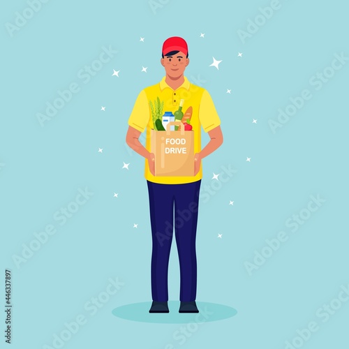 Volunteer holding a donation box, package with grocery. Charity, food donation for needy and poor people. Vector illustration