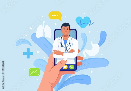 Online doctor. Virtual medicine. Mobile app for call to physician. Ask medic. Health consultation, diagnosis. Hand hold cellphone