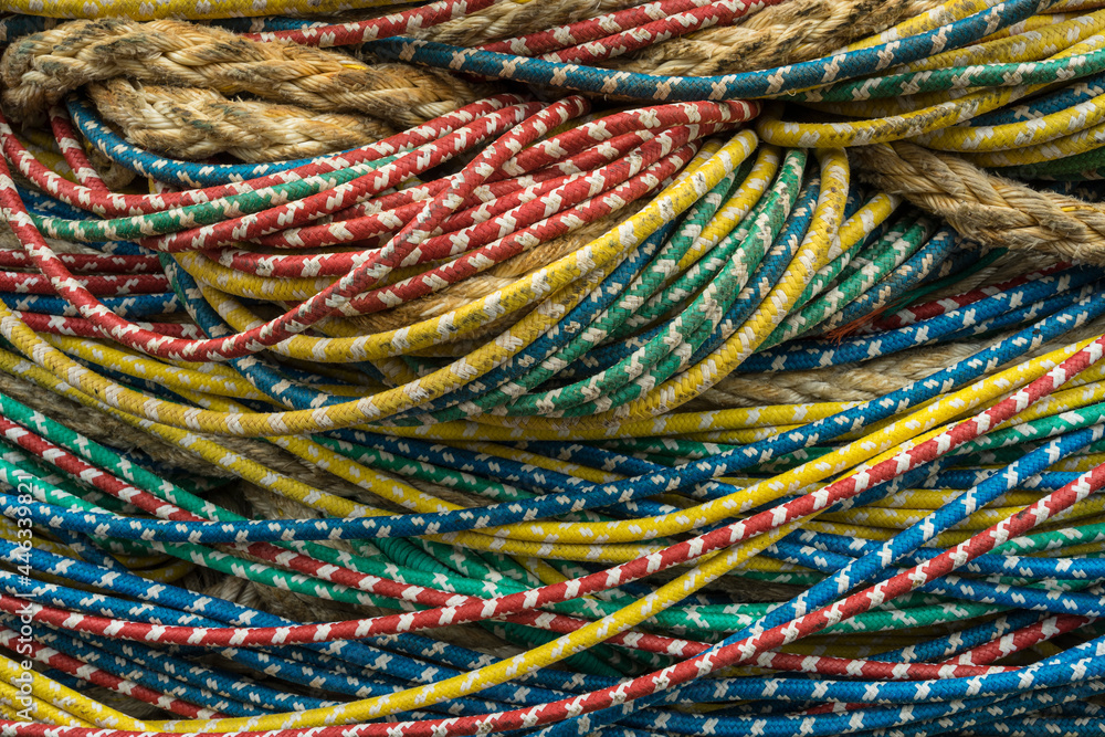 a pile of fishing ropes on a pier