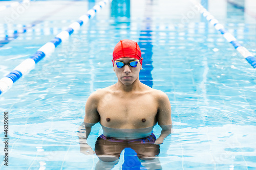 portrait of young latin man swimmer at the pool in Mexico Latin America © Marcos