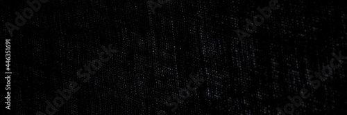 abstract rough dark background of linen natural fabric on the light, short focus © BUSLIQ