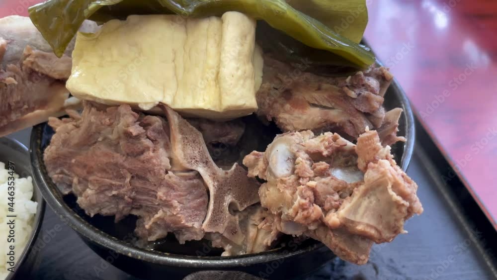 OKINAWA, JAPAN : Okinawa traditional food “Hone jiru (Pork bone soup)”. OKINAWA, JAPAN : Okinawa traditional food “Hone jiru (Pork bone soup)”.