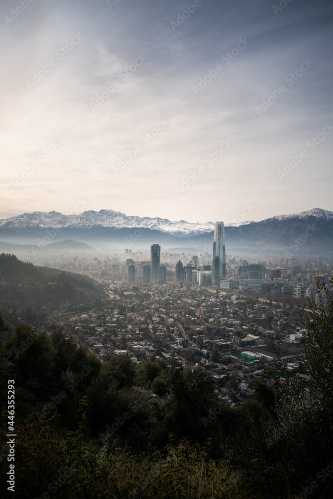 A view of Santiago, Chile, from the mountains, with the snowy mountains behind