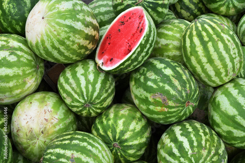 Ripe watermelons of the new harvest are sold in the bazaar 
