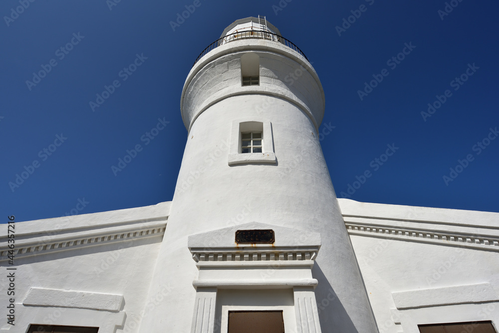 a lighthouse and blue sky in Yakushima, Kagoshima, Japan a lighthouse and blue sky in Yakushima, Kagoshima, Japan