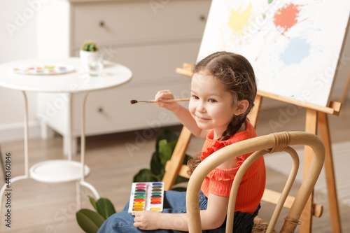Cute little artist painting...