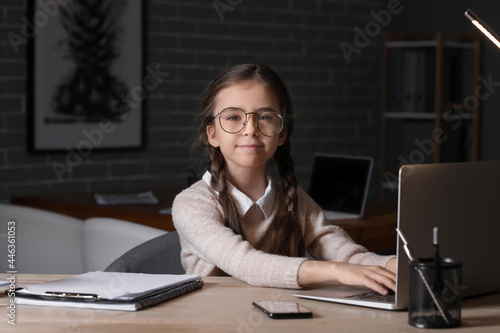 Cute little businesswoman u...