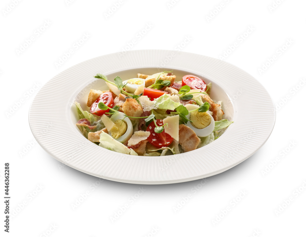 Plate with tasty Caesar salad on white background