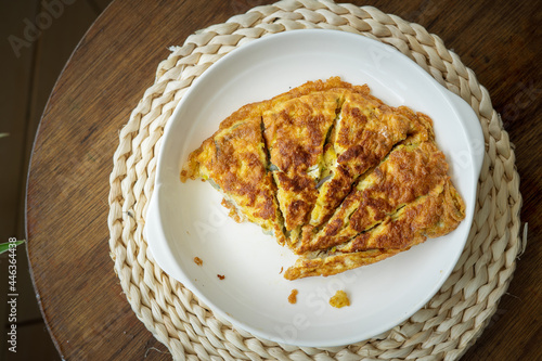 Malaysian omelete or telur dadar served on the table. photo