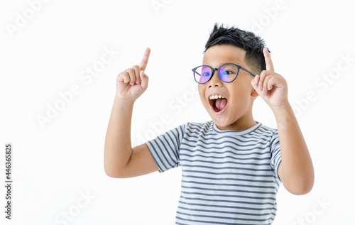 Cutout portrait of pretty smart young healthy Asian boy wearing glasses and horizontal striped shirt happily raising hands and index fingers up with smile and shout out loud for signal sending