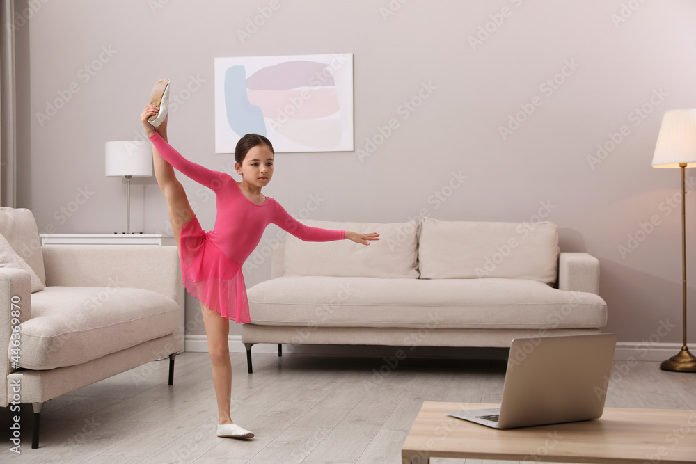 Cute little girl taking online dance class at home Cute little girl taking online dance class at home