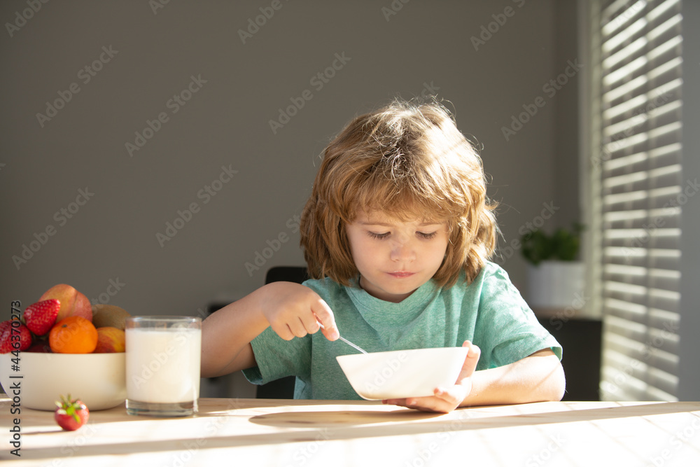 Child eating healthy food. Cute little boy having soup for lunch. Healthy nutrition for kids. Child eating healthy food. Cute little boy having soup for lunch. Healthy nutrition for kids.