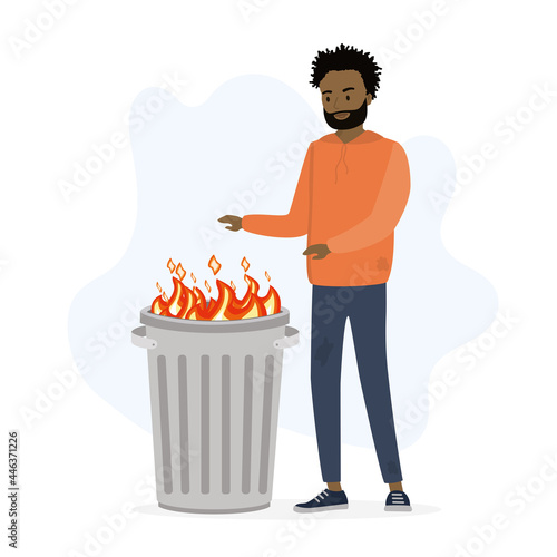 Homeless vagabond man warms hands by fire. Garbage is burning in trash can. Unhappy african american character isolated on white background. Poverty,