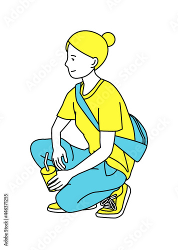 A woman squatting in summer clothes