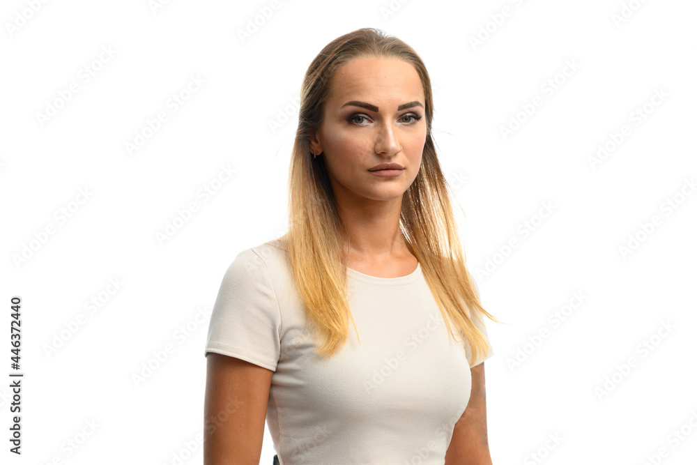 Portrait of a caucasian girl on a white isolate looking directly at the camera Portrait of a caucasian girl on a white isolate looking directly at the camera