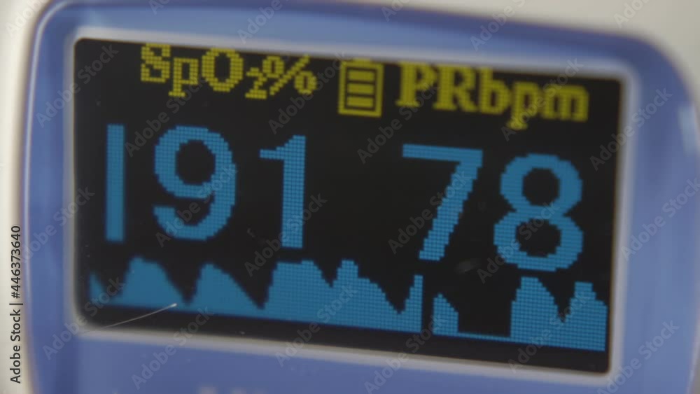 A display of pulse oximeter. If the oxygen level is lower than 92%, it is the sign of covid-19 infection. A display of pulse oximeter. If the oxygen level is lower than 92%, it is the sign of covid-19 infection.