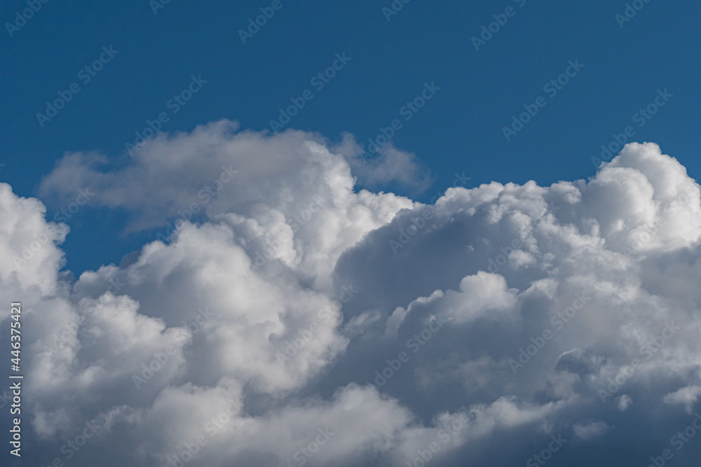 beautiful thick cloud under the blue sky on a sunny day beautiful thick cloud under the blue sky on a sunny day