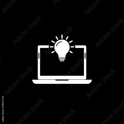 Laptop with light bulb icon isolated on dark background