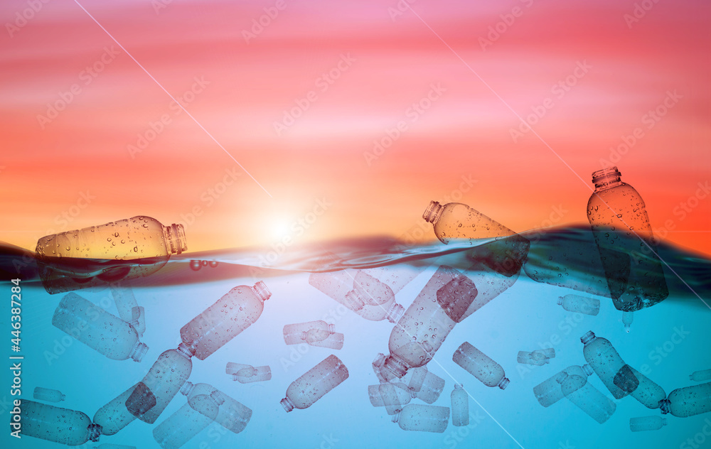 The world floats in water with only plastic waste.Plastic bottles float in the sea. Plastic