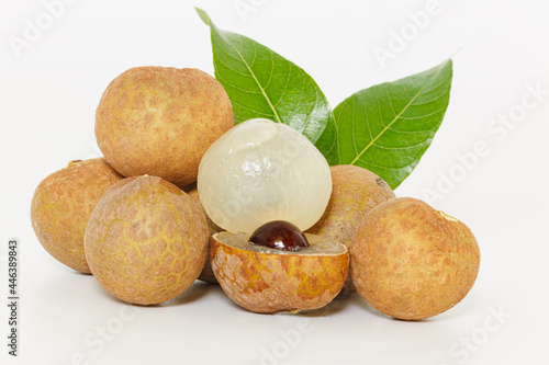 Fruit fresh longan with leaf  ripe and sweet on white background close up