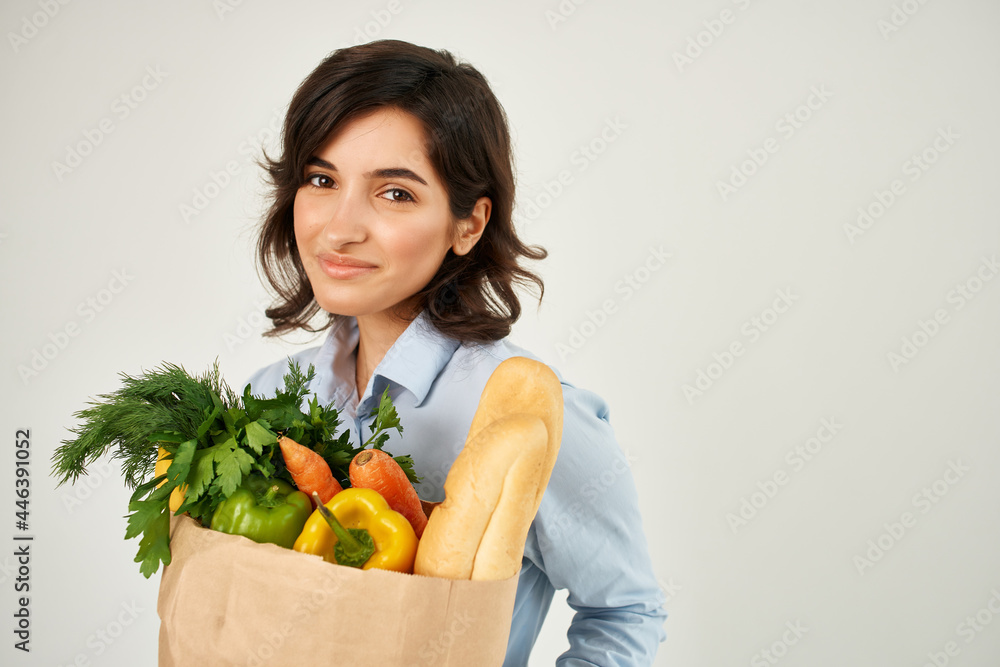 pretty woman package with groceries vegetables delivery supermarket close up pretty woman package with groceries vegetables delivery supermarket close up