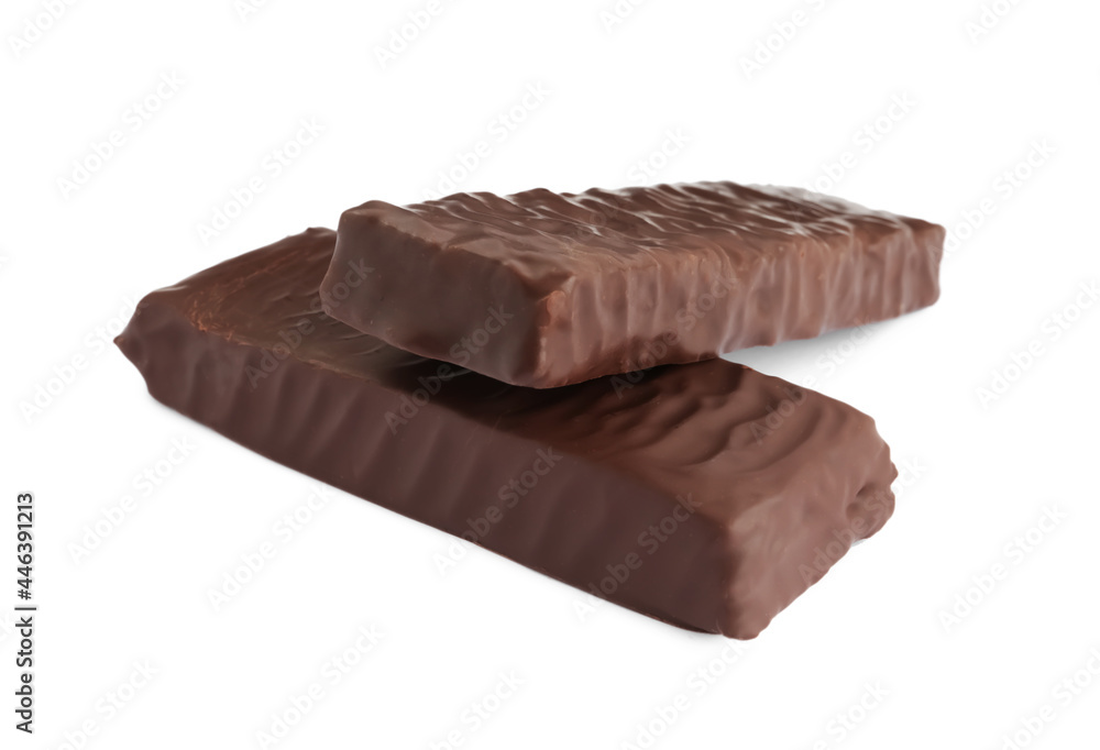 Tasty chocolate glazed protein bars on white background. Healthy snack