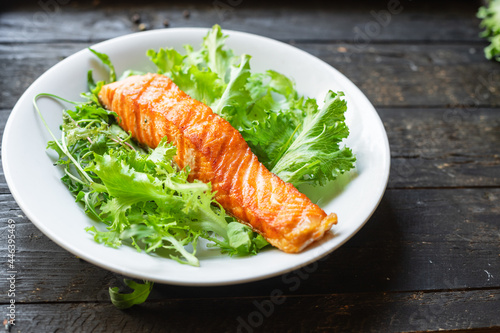 salmon grill fried seafood fish grilled food organic product meal snack on the table copy space food background rustic. top view keto or paleo diet vegetarian food pescetarian diet