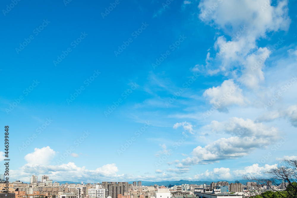 Clear sky with clouds above the metropolitan area of New Taipei City, Taiwan Clear sky with clouds above the metropolitan area of New Taipei City, Taiwan
