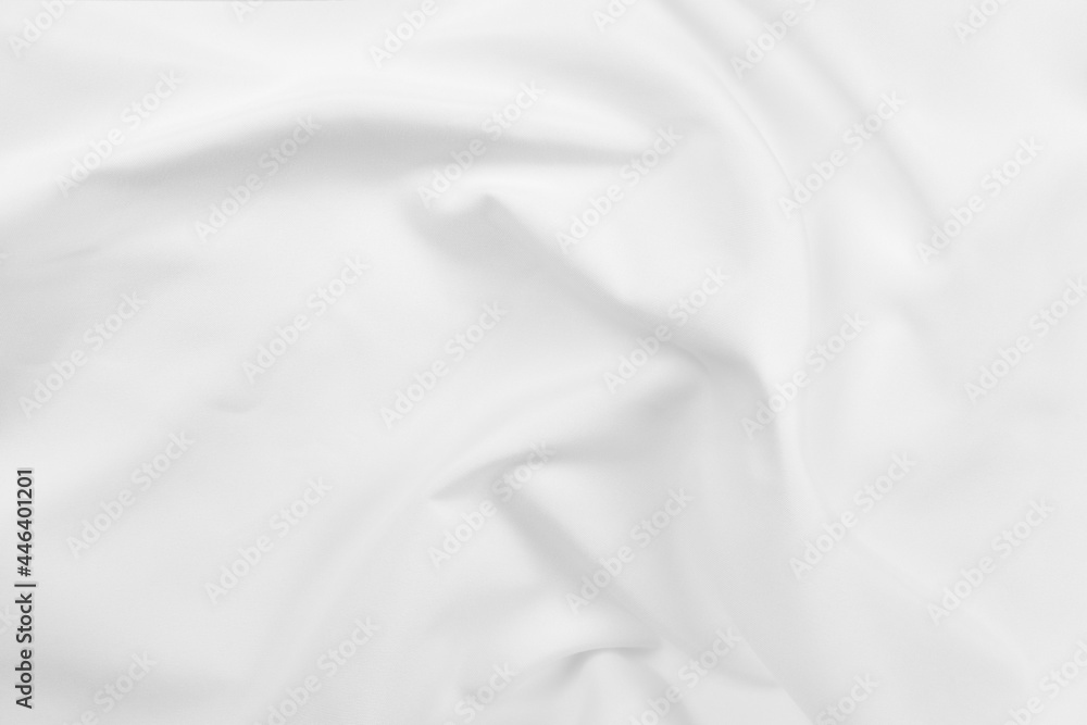 Naklejka premium Abstract white fabric texture background. Cloth soft wave. Creases of satin, silk, and cotton.