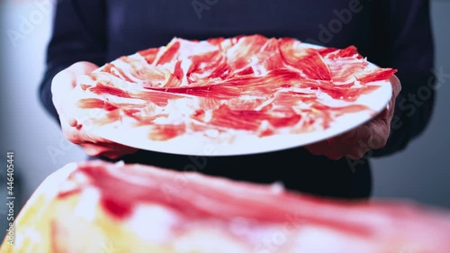 Wallpaper Mural Plate of delicious Iberian ham on a wooden table background with a ham knife and metal tongs. Appetizing slices of Iberian ham. Acorn-fed Iberian Ham. Typical Spanish or Catalan food. 4k video. Torontodigital.ca