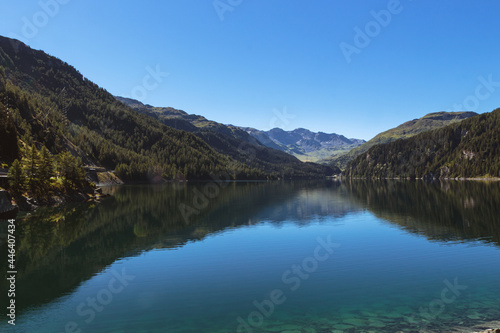 Marmorera lake on a bright summer day under clear blue sky. Julier pass, Grisons, Switzerland