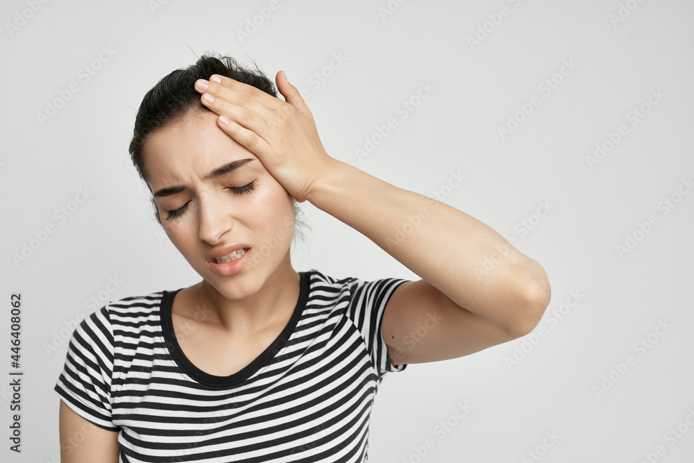 woman holding her head medicine treatment stress headache woman holding her head medicine treatment stress headache