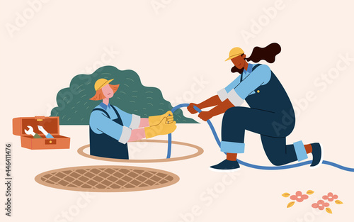Female working in manhole plumbing