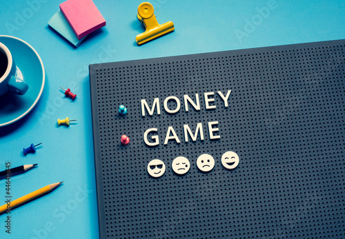 Money game with text on desk.strategy and plan.