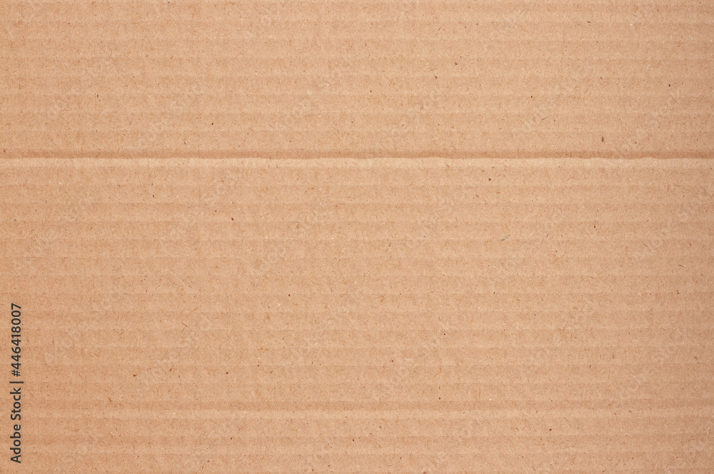 Fototapeta premium Brown cardboard sheet abstract background, texture of recycle paper box in old vintage pattern for design art work.