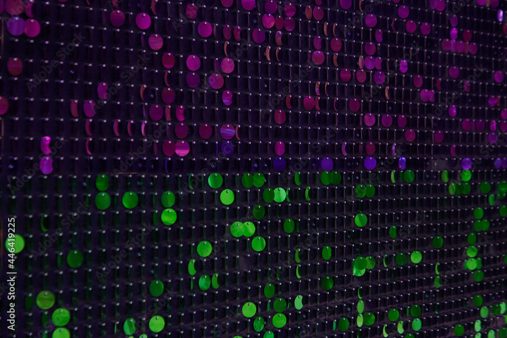 shiny texture of the background, a set of round purple sequins sewn on the fabric like fish scales shiny texture of the background, a set of round purple sequins sewn on the fabric like fish scales
