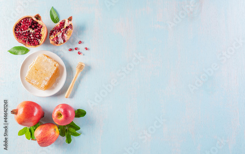 Rosh hashanah  jewish New Year holiday   Concept of traditional or religion symbols on blue pastel wooden background.