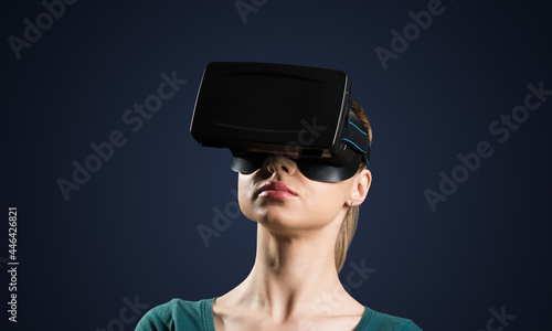 Young woman in VR glasses © adam121