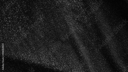 Glittering fashion black background with twinkling grainy texture