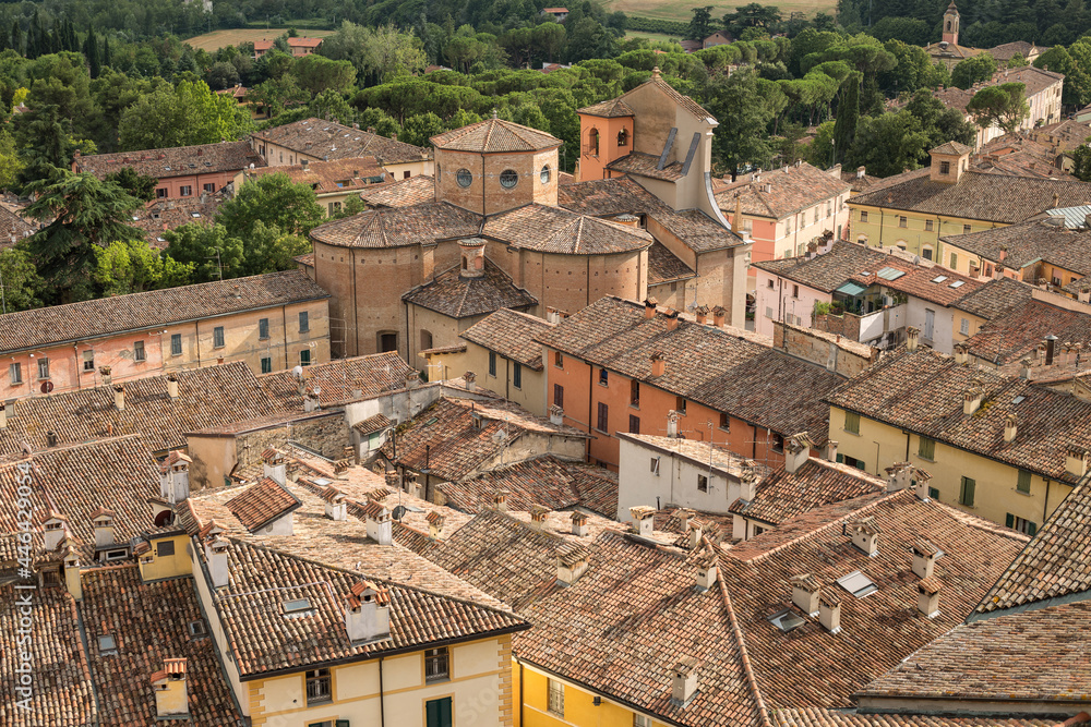Brisighella, Ravenna, Emilia-Romagna, Italy. Aerial view of tiled rooftops and church of San Michele Arcangelo