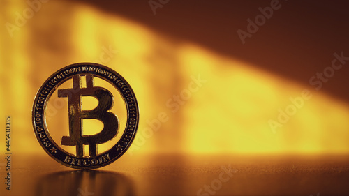 Trade bitcoin. Golden Bit Coin virtual cryptocurrency or blockchain technology. Gold Crypto currency BTC Bitcoin on black background. Block chain, network connect concept.