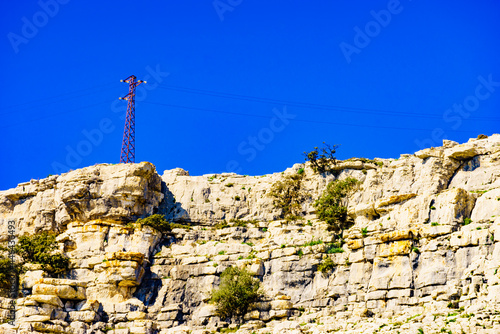 Power lines on rock formations, Torcal de Antequera, Spain