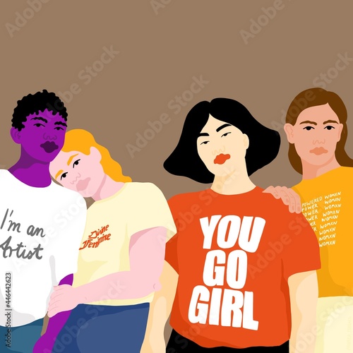 Four women with feminist statement T-Shirts. 