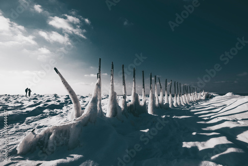 ice hummocks frozen water snow breakwaters on the sea