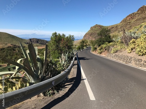 Road on Gran Canaria island with view on Tenerife and Teide volcano. Agaete valley.